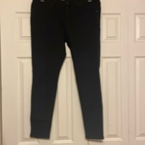 Black Mossimo mid rise jeggings. Super elastic stretch. Size 14.